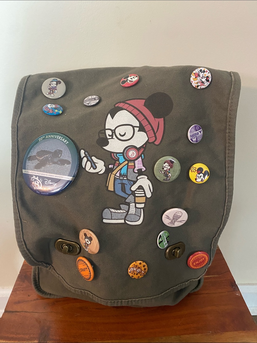 Disney WonderGround Gallery Hipster Mickey Mouse Messenger Bag in olive green.